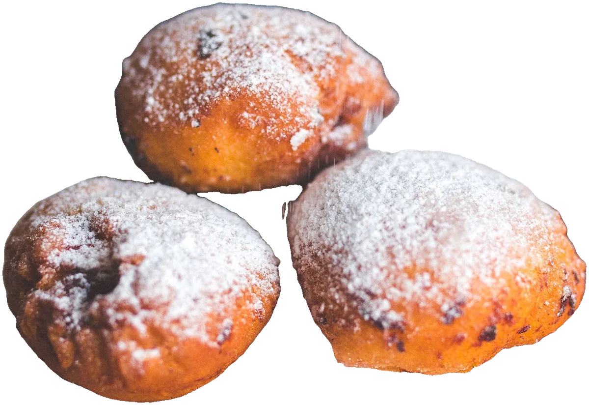 Drie verse oliebollen met poedersuiker
